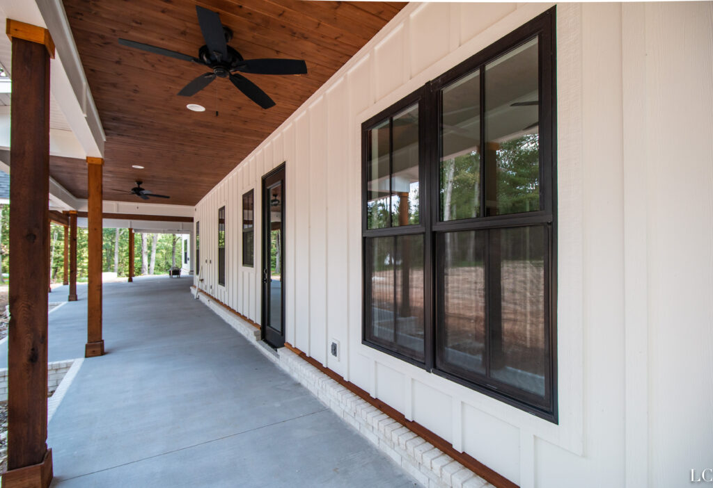 A corridor outside of a wooden building